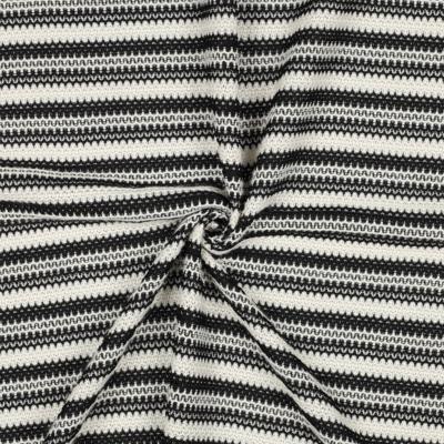 Tissu  crochet noir et crème